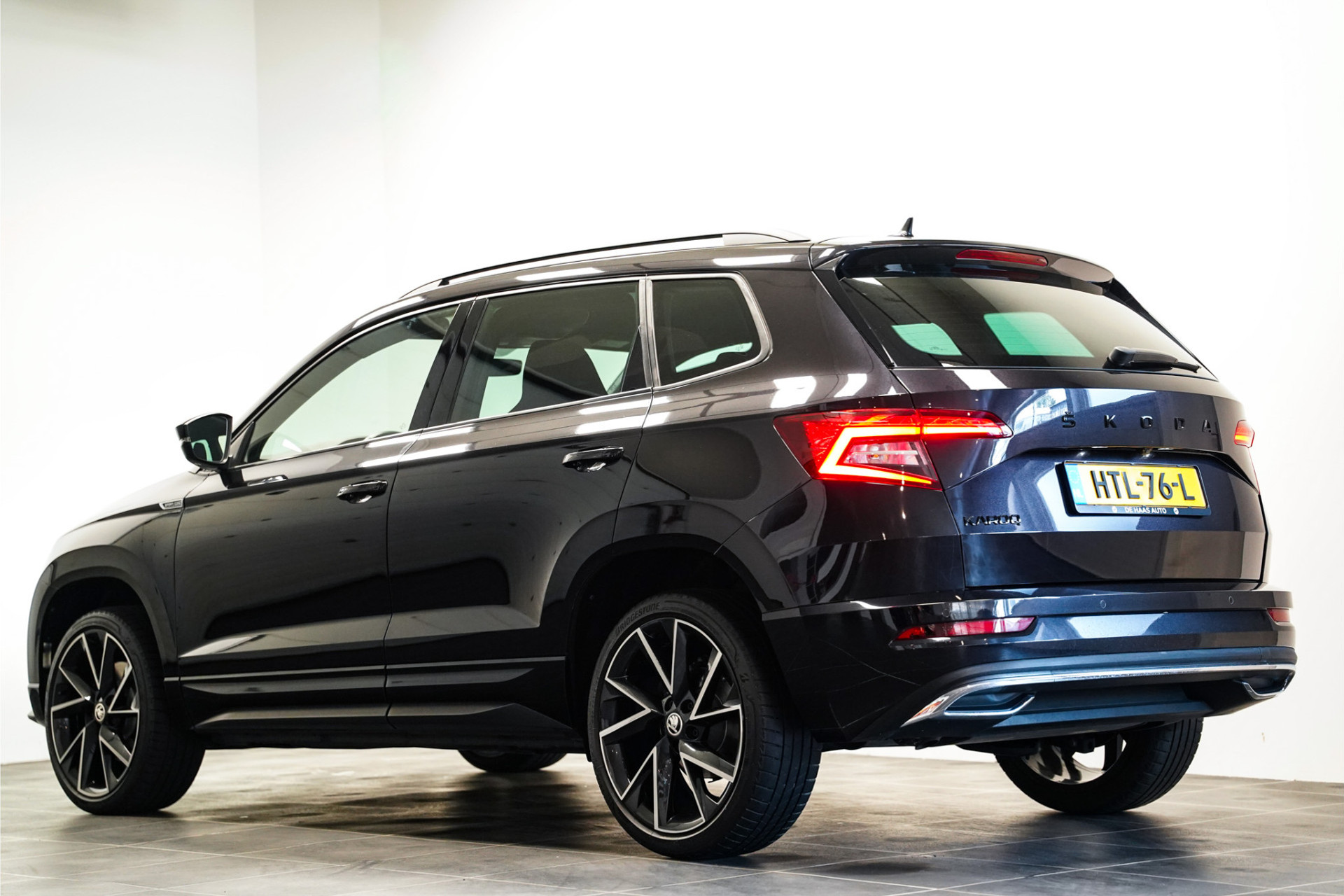 Škoda Karoq 1.5 TSI Sportline|19 inch|Camera|Apple carplay 45787093-1.jpg | De Haas Auto