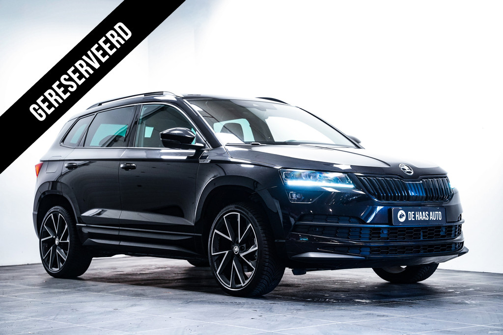 Škoda Karoq 1.5 TSI Sportline|Pano dak|19 inch|Trekhaak|Camera 51789881-0.jpg | De Haas Auto